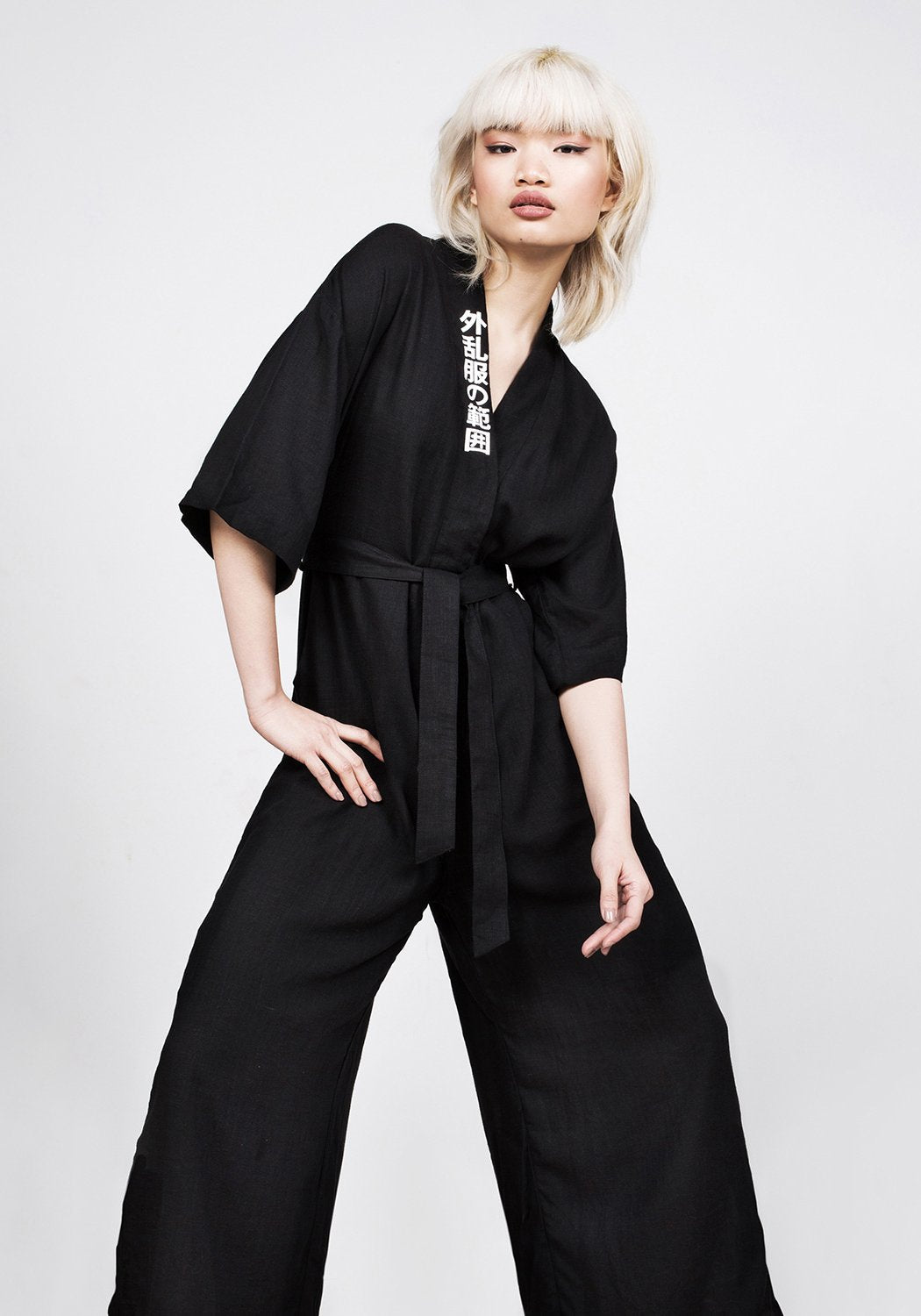 Black Kimono-Style Jumpsuit with V-Neck & Flared Legs | Disturbia