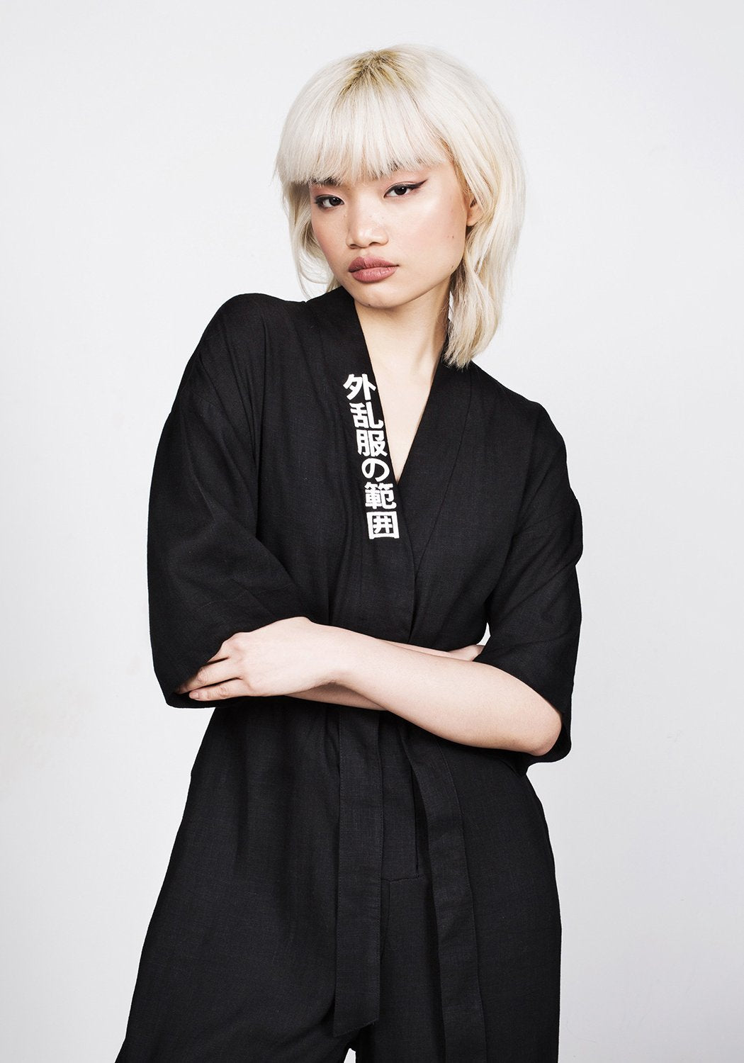 Black Kimono-Style Jumpsuit with V-Neck & Flared Legs | Disturbia