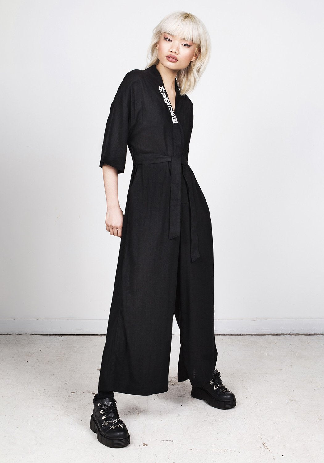 Black Kimono-Style Jumpsuit with V-Neck & Flared Legs | Disturbia