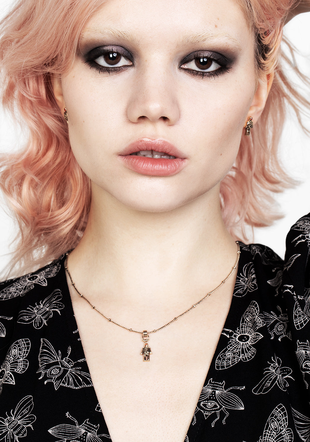 Gold-Plated Wicker Man Pendant Necklace with Cubic Zirconia | Delicate Trace Chain