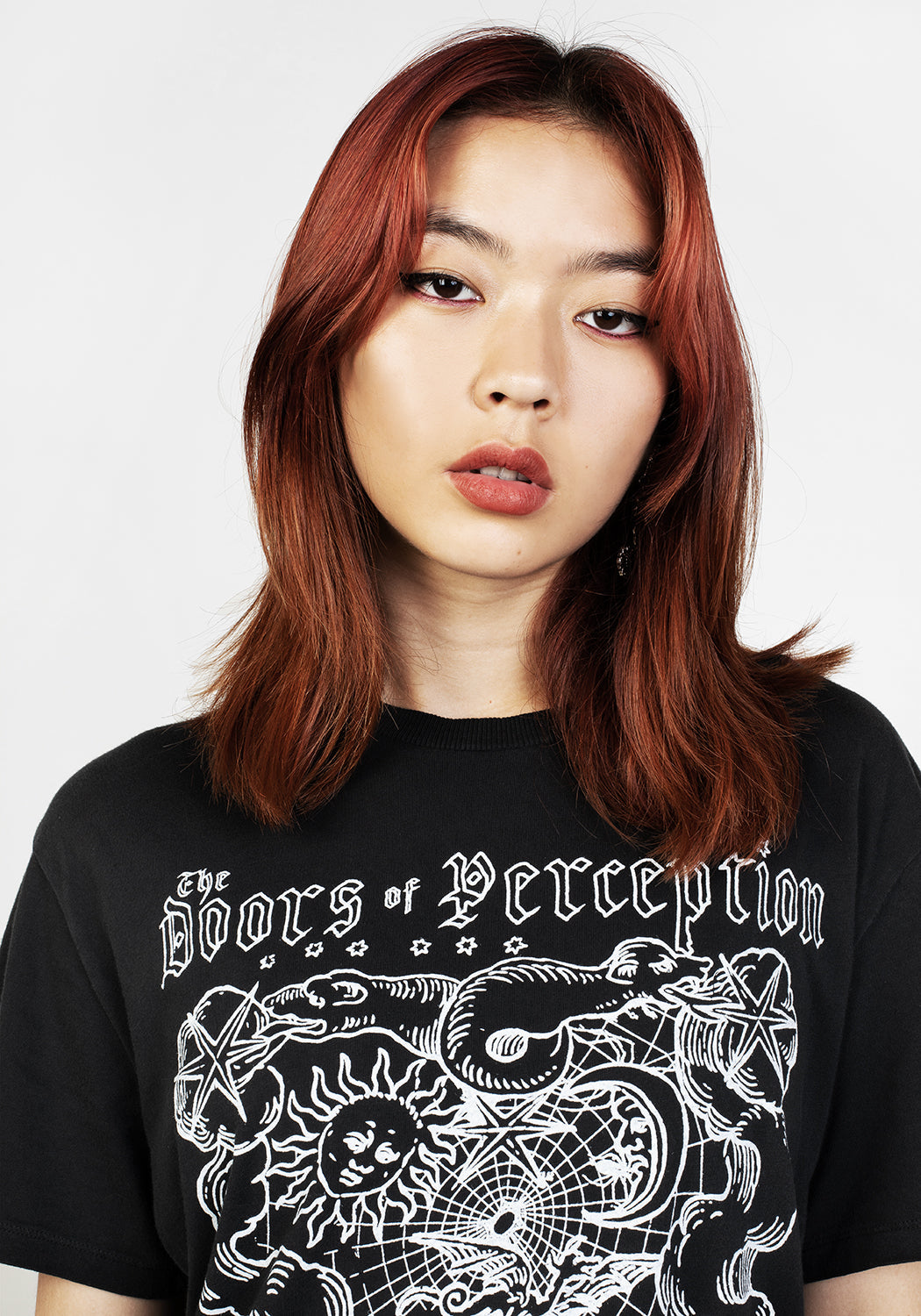 Black Graphic T-Shirt with Vintage Wash & Crew Neck | Perception