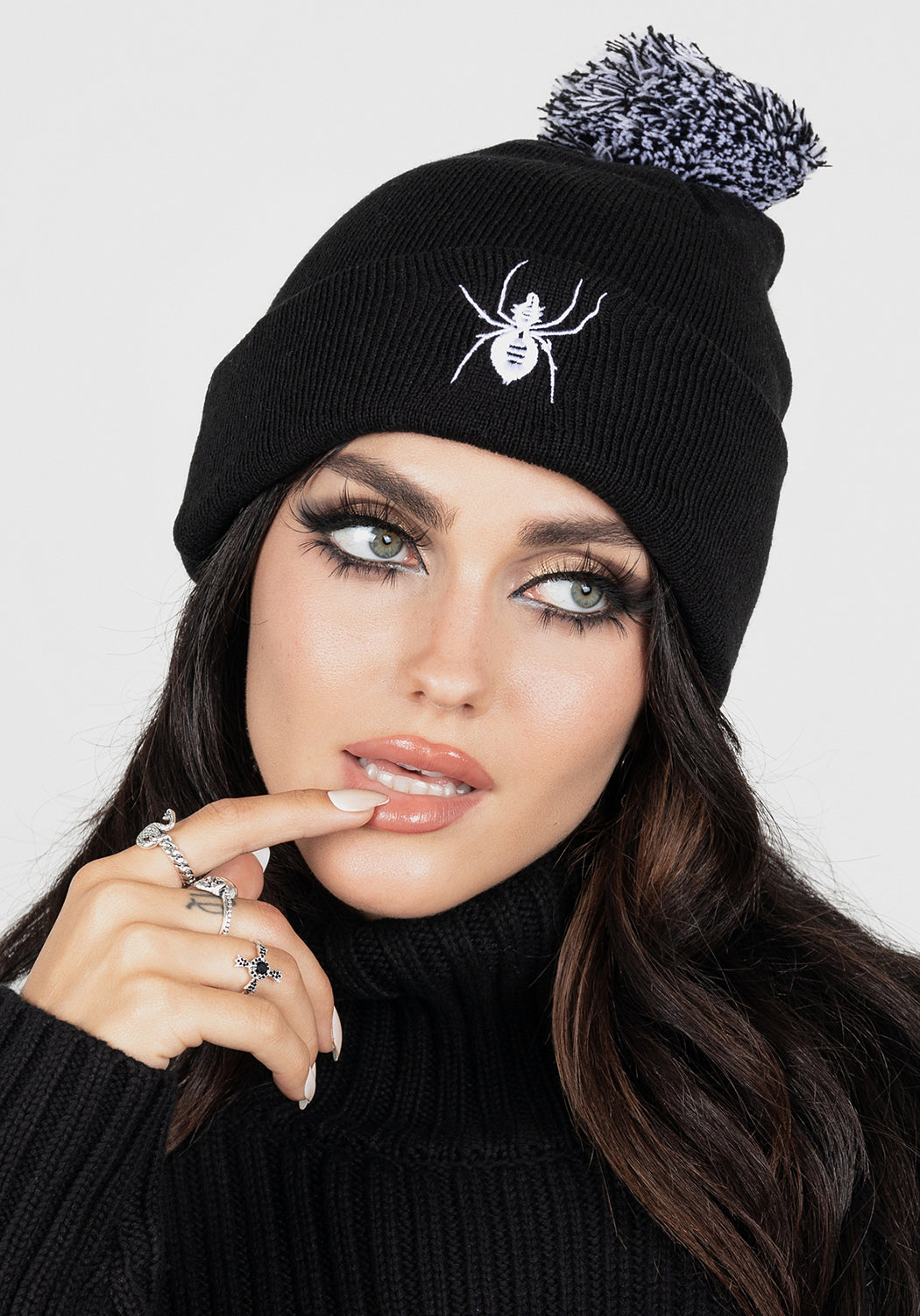 Embroidered Pom Pom Beanie with Spider Design | Spinneret