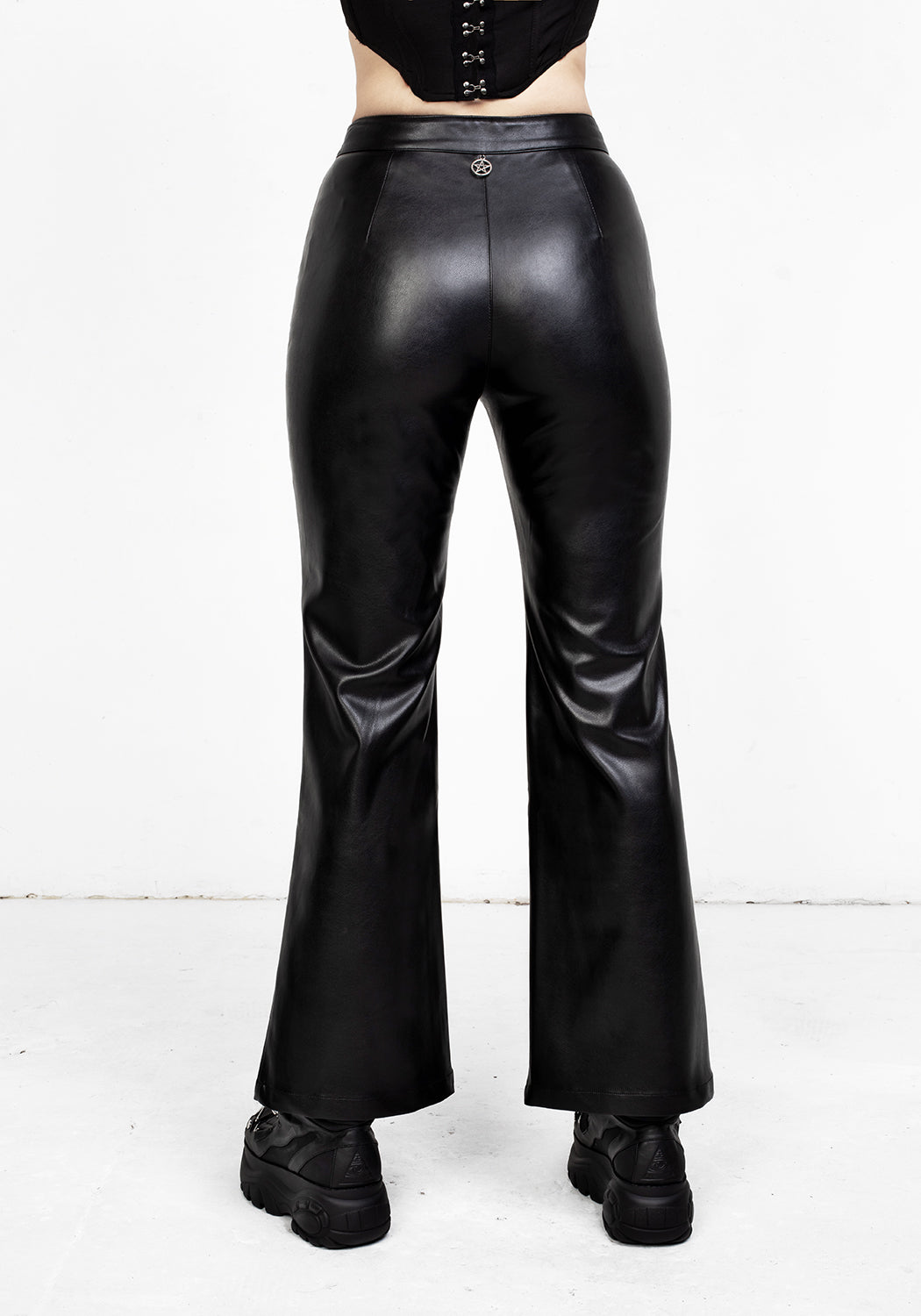 Black Leather Flared Trousers with Silver Pentagram Charm | Bronte