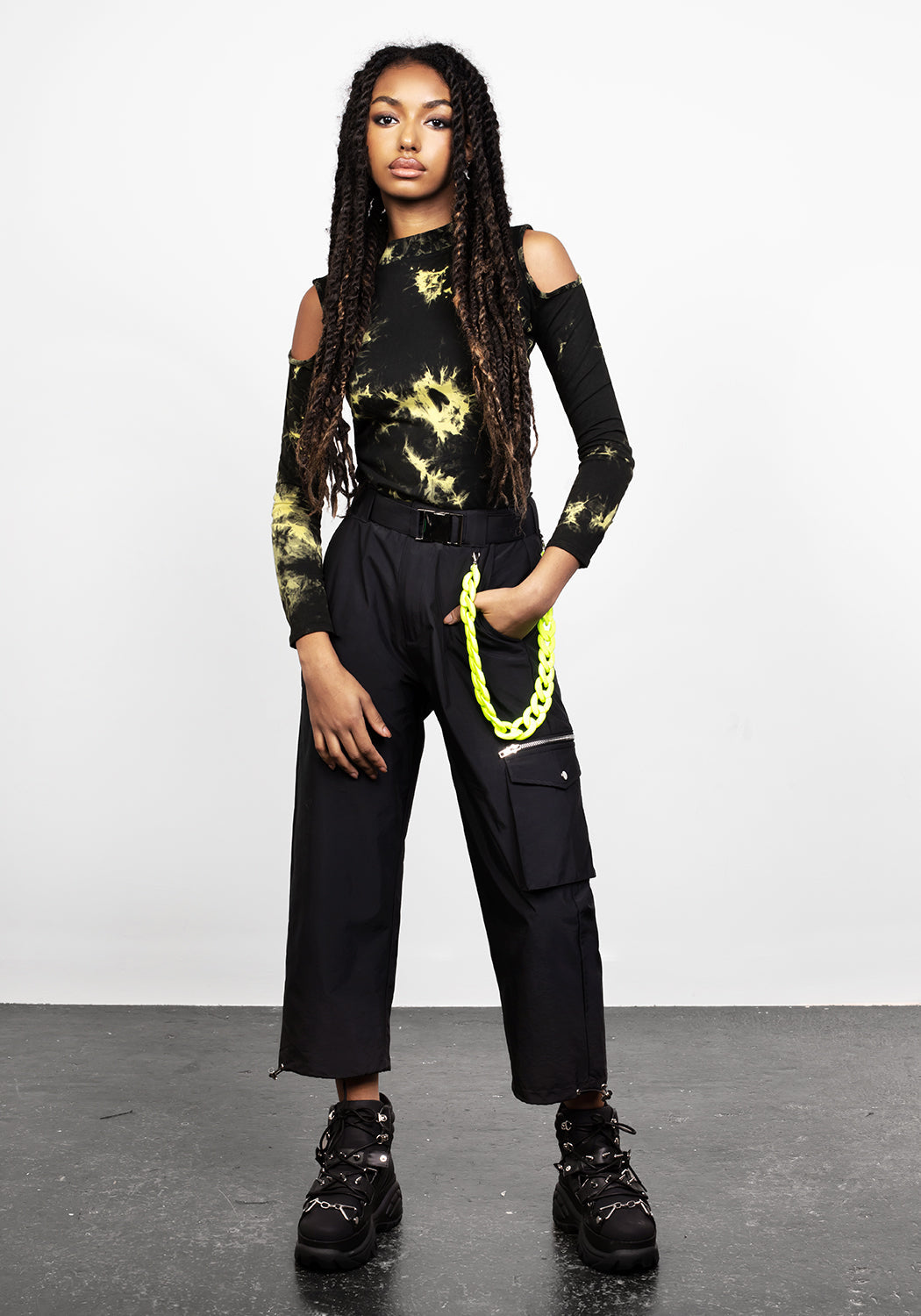 Black Cropped Cargo Pants with Lime Chain & Toggle Cuffs | Reckless