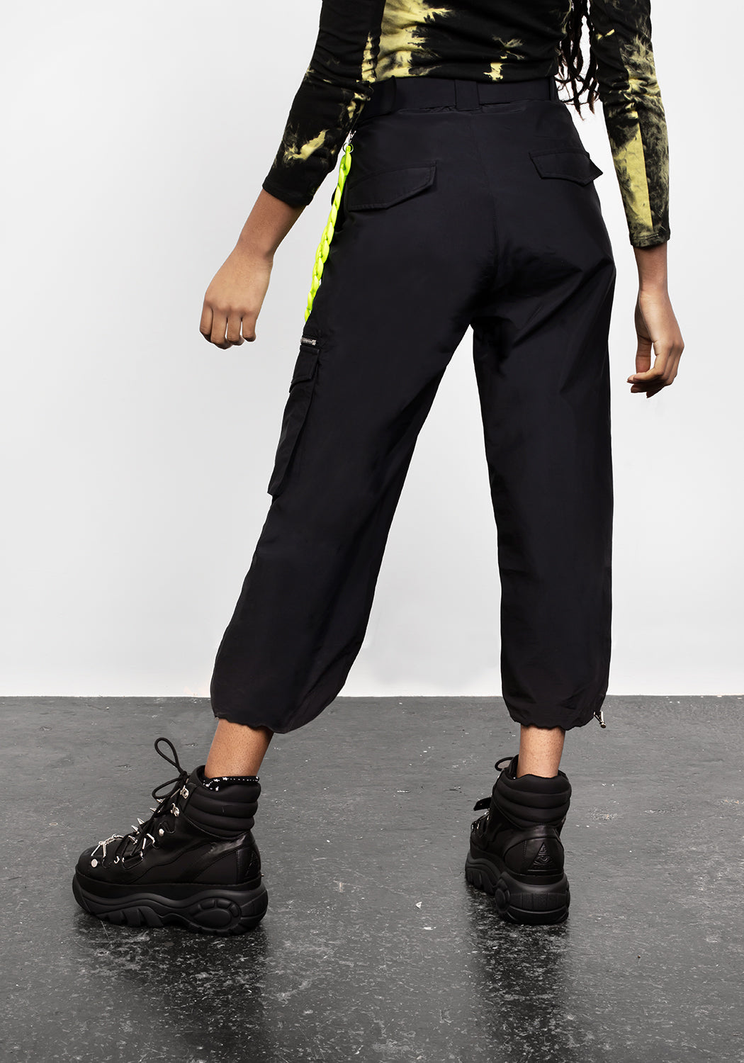 Black Cropped Cargo Pants with Lime Chain & Toggle Cuffs | Reckless