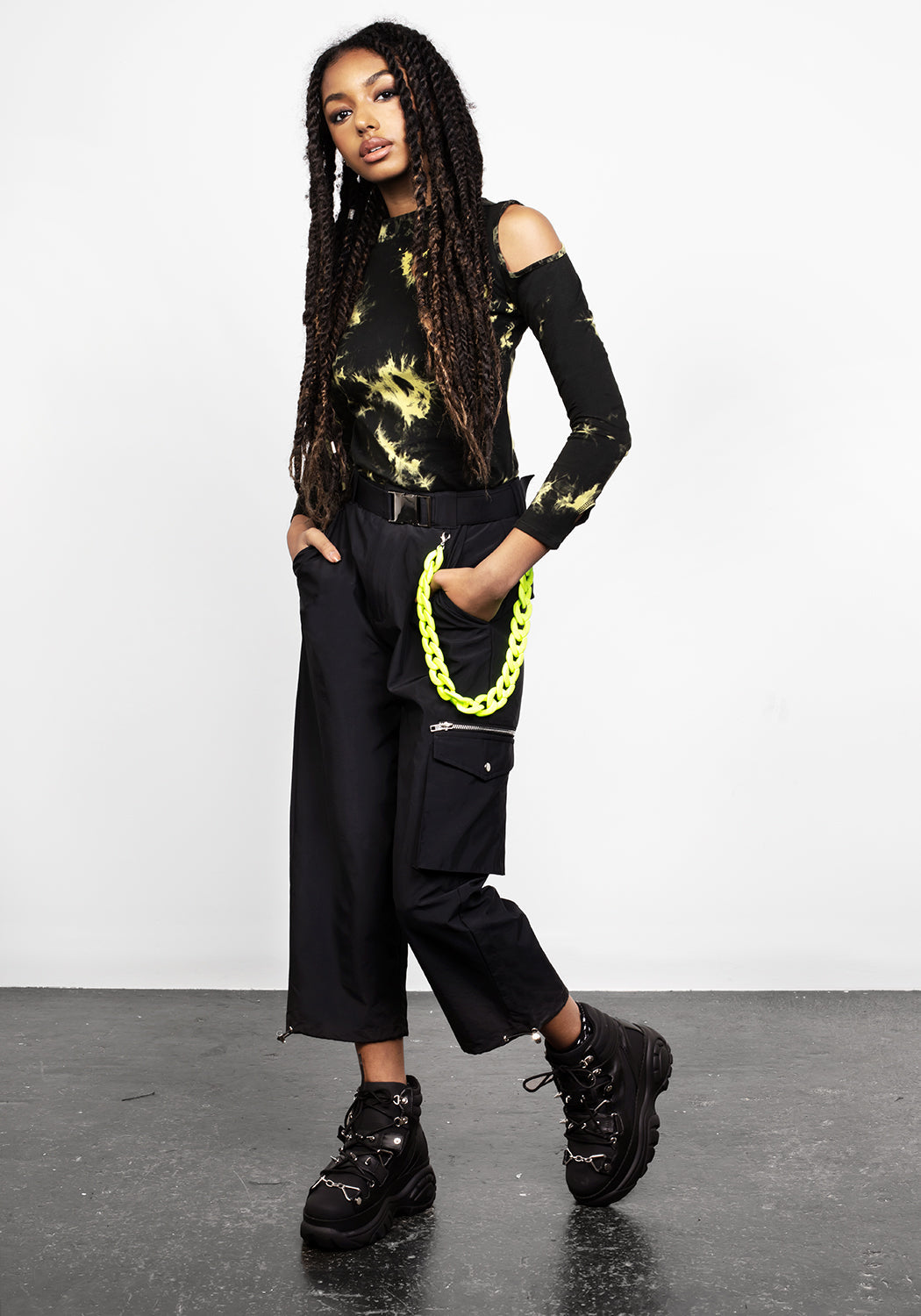 Black Cropped Cargo Pants with Lime Chain & Toggle Cuffs | Reckless