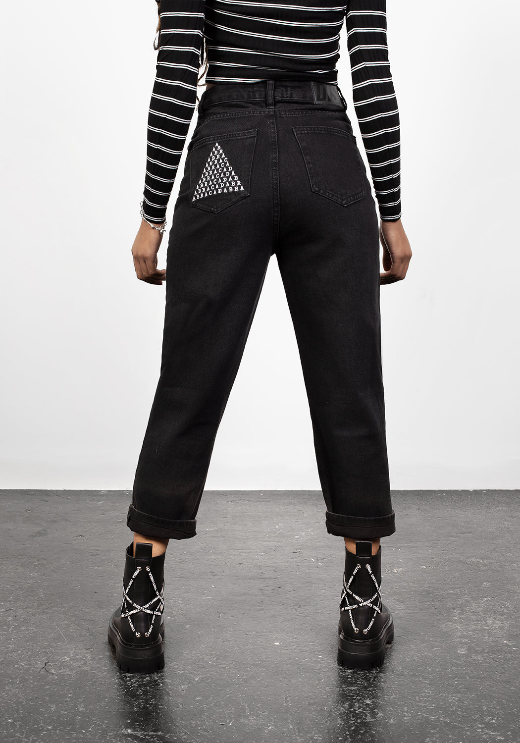 Distressed Black Denim Mom Jeans with Abracadabra Embroidery | Busted Knee Jean